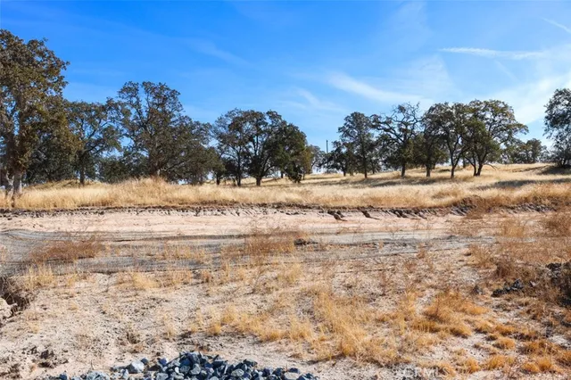 a view of a road with a building in the background