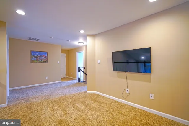 a view of a livingroom with a flat screen tv