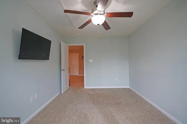 a view of a livingroom with a flat screen tv
