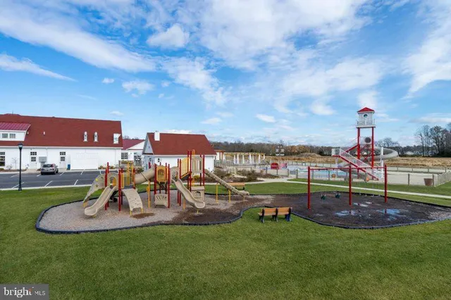 a view of a park with sitting area