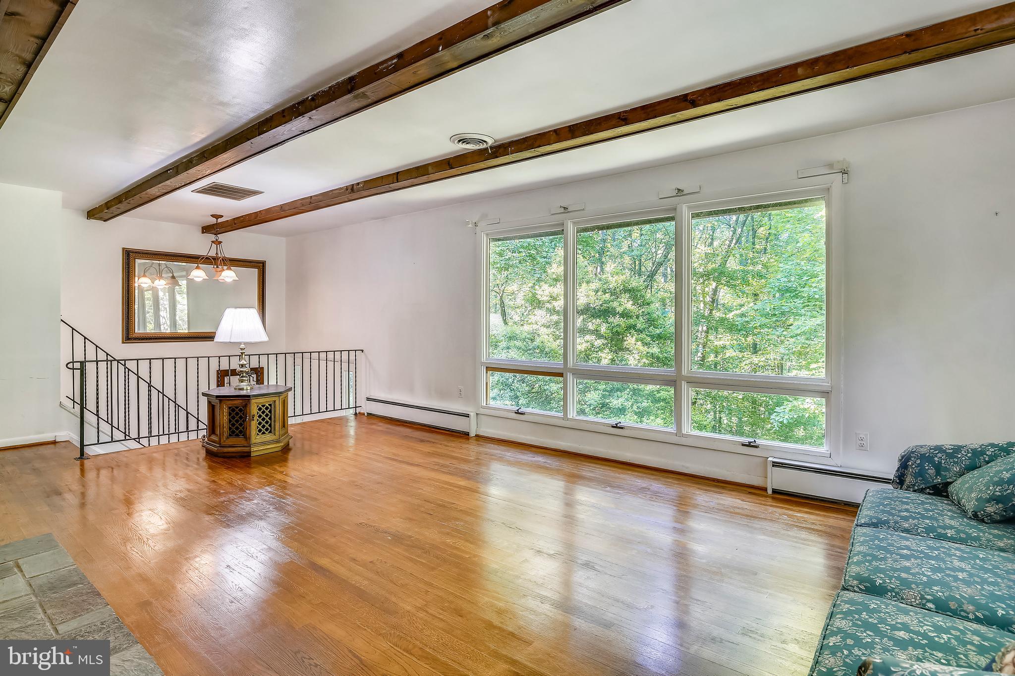 10614 Hunters Valley Road Vienna, VA 22181 - Photo 14 of 37 Living Room overlooking wooded privacy