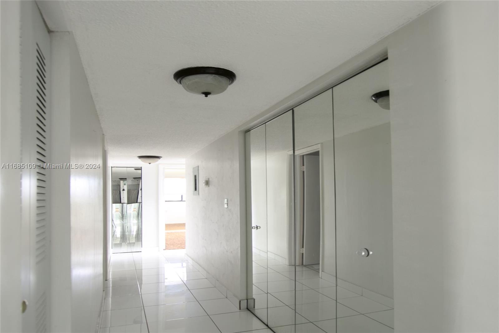 9626 West McNab Road, Unit 206 Tamarac, FL 33321 - Photo 11 of 21 a view of a hallway