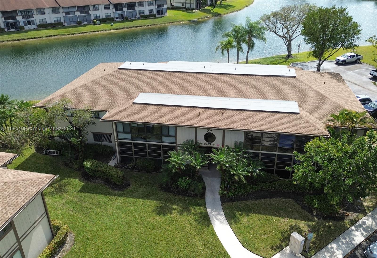 9626 West McNab Road, Unit 206 Tamarac, FL 33321 - Photo 16 of 21 an aerial view of a house having yard