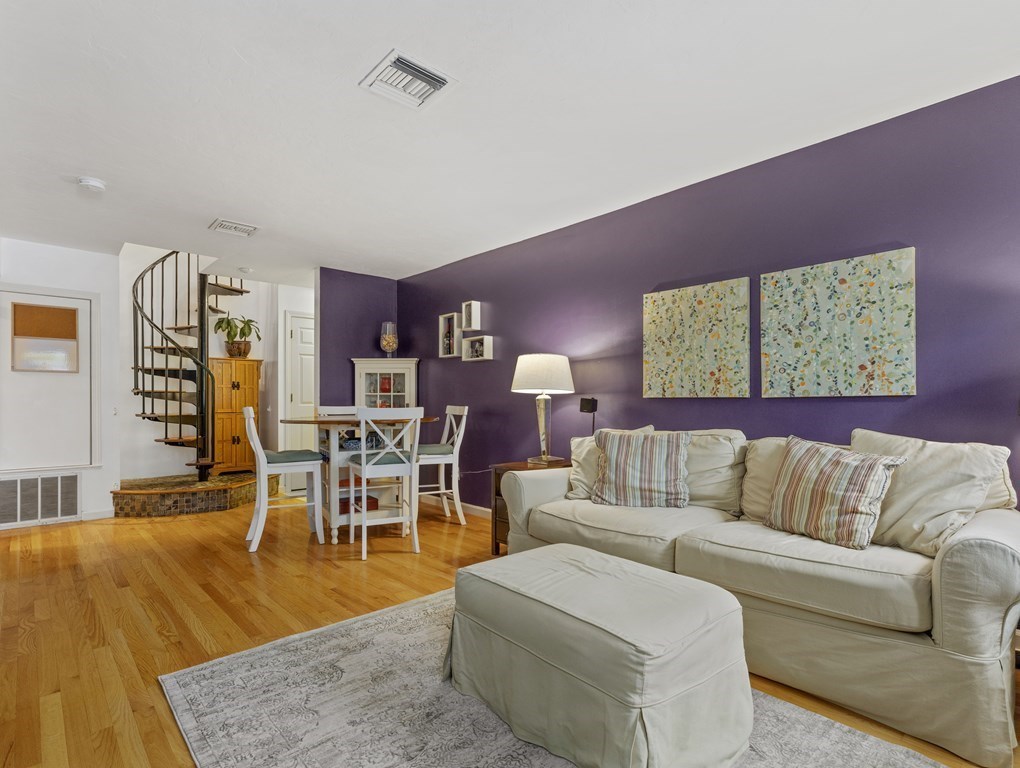 15 Church Street, Unit 8 Natick, MA 01760 - Photo 4 of 14 a living room with furniture and a table