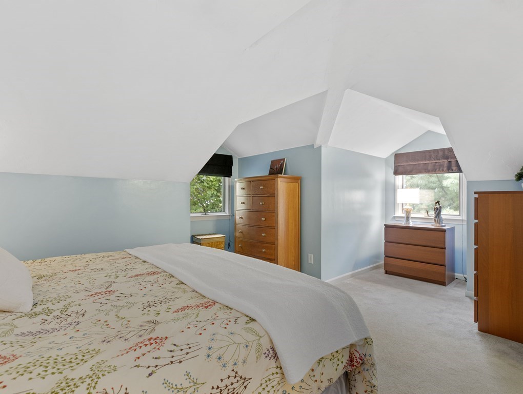 15 Church Street, Unit 8 Natick, MA 01760 - Photo 9 of 14 a bedroom with a large bed and a window