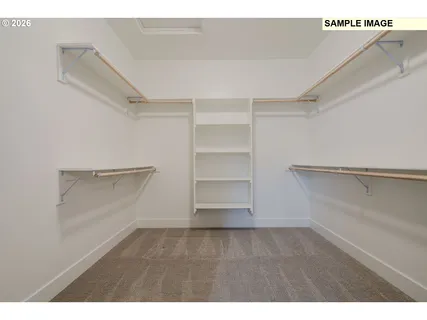 a view of an empty walk in closet