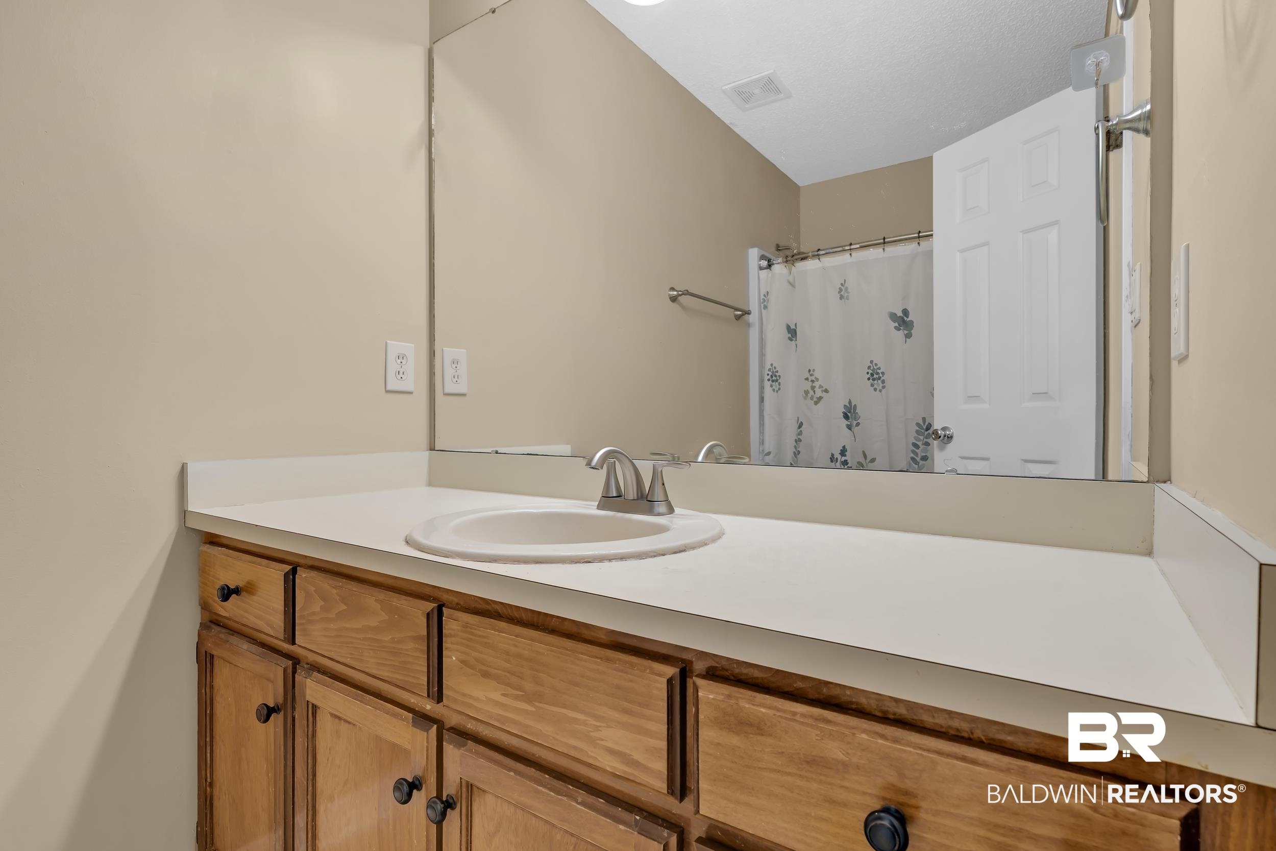 125 Dunbar Loop Daphne, AL 36526 - Photo 11 of 17 Bathroom with a shower with shower curtain and vanity