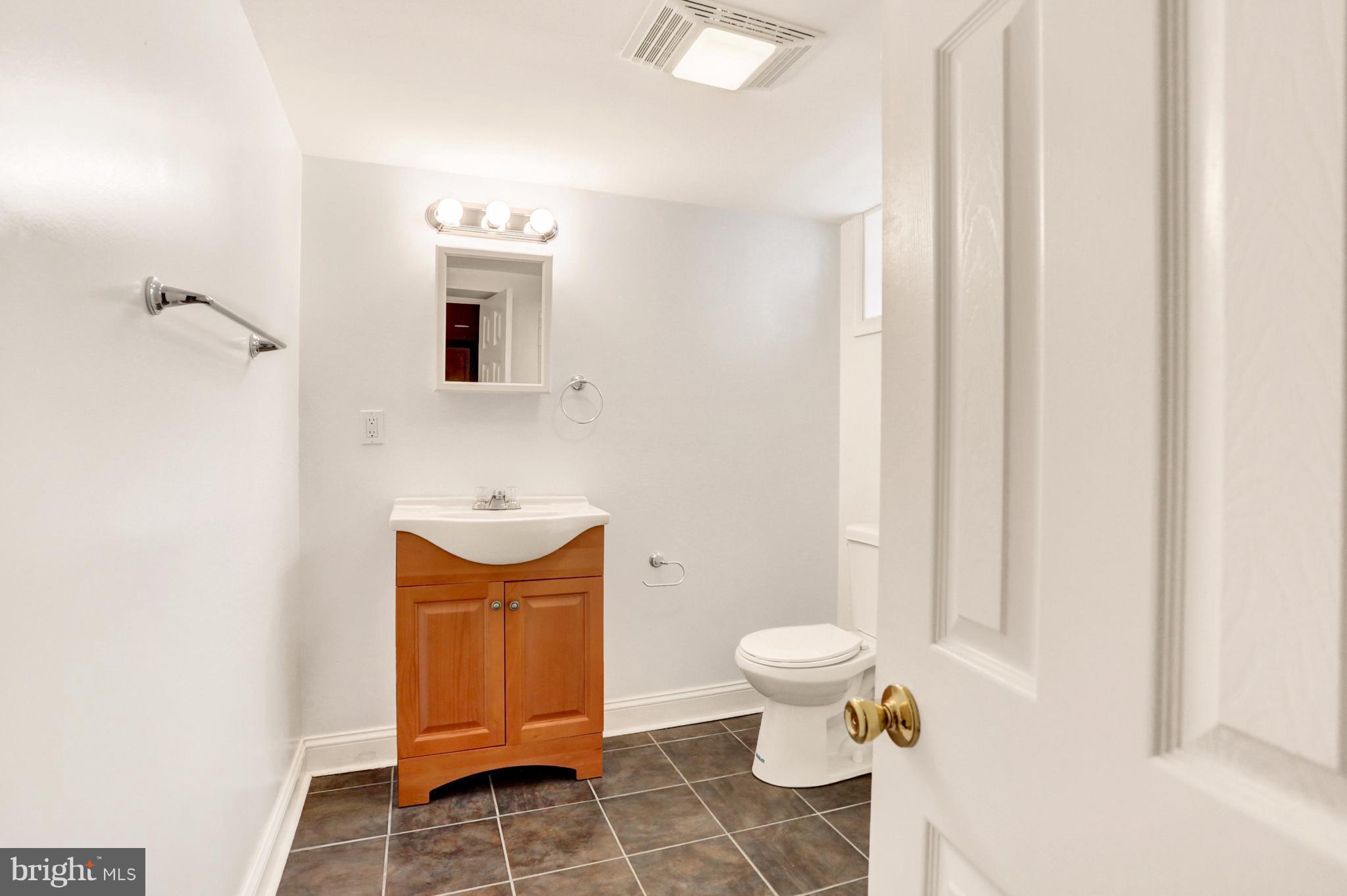1528 Shadyside Road Baltimore, MD 21218 - Photo 16 of 27 brand new lower level bath