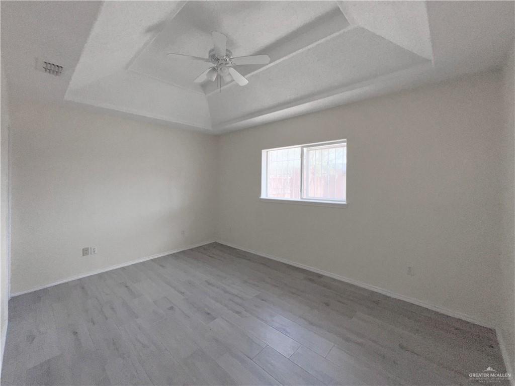 5716 North 38th Street McAllen, TX 78504 - Photo 18 of 28 an empty room with a window
