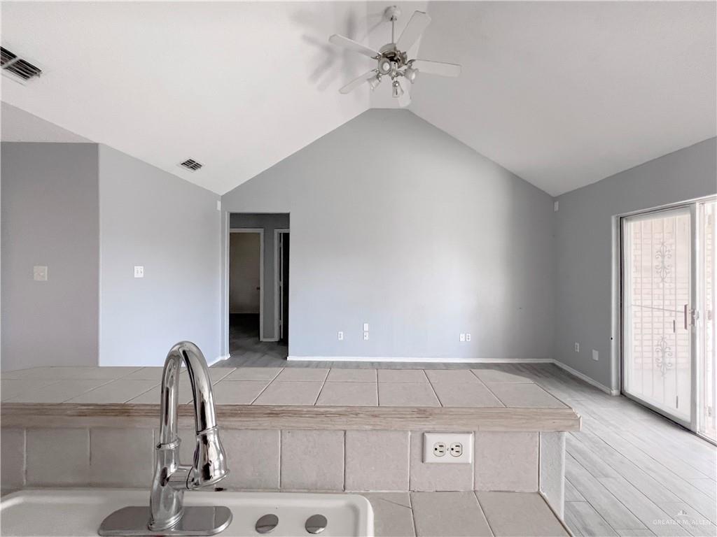5716 North 38th Street McAllen, TX 78504 - Photo 8 of 28 a view of a kitchen with a sink and cabinet