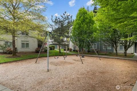a view of a park with swings on the wall