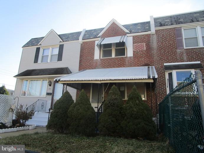 8149 Leon Street Philadelphia, PA 19136 - Photo 3 of 19 a front view of a house with a yard