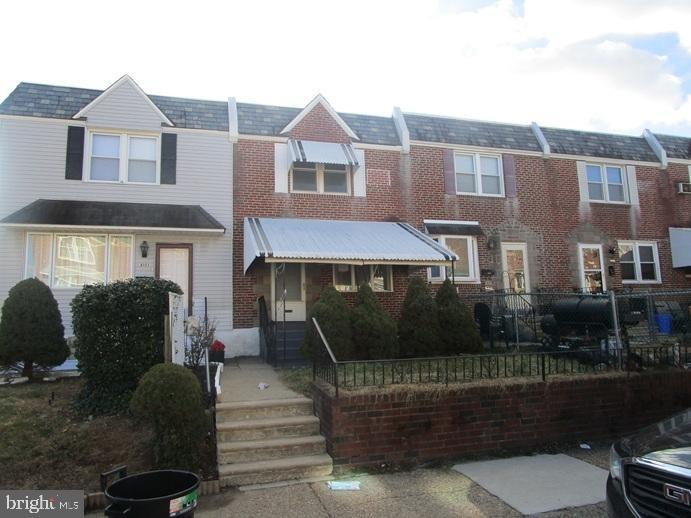 8149 Leon Street Philadelphia, PA 19136 - Photo 4 of 19 a front view of a house with garden