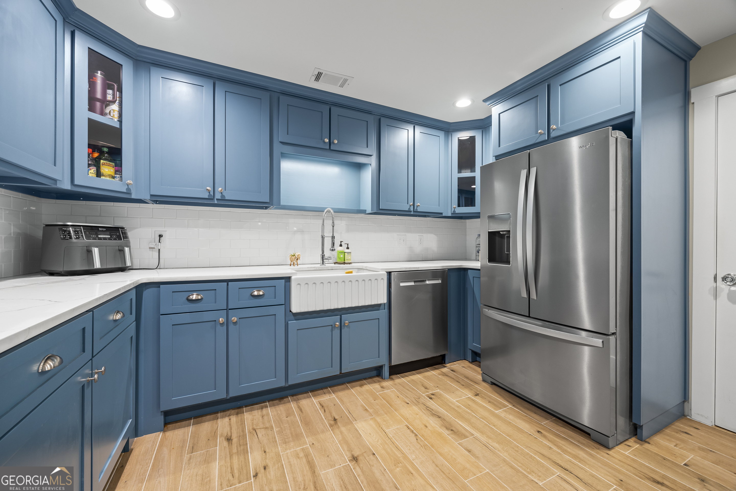 711 Shackelford Road Royston, GA 30662 - Photo 18 of 50 a kitchen with stainless steel appliances granite countertop a refrigerator and a sink