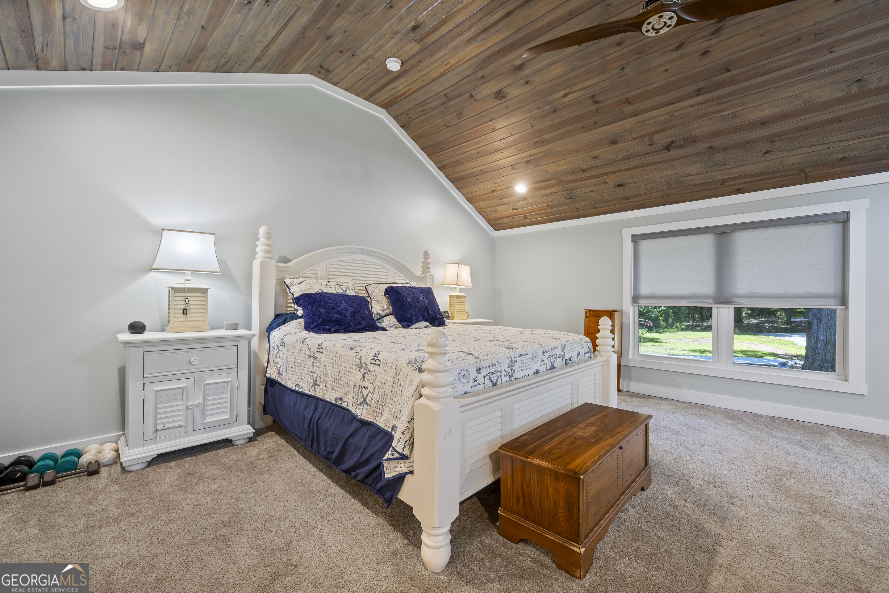 711 Shackelford Road Royston, GA 30662 - Photo 22 of 50 a spacious bedroom with a bed and a window