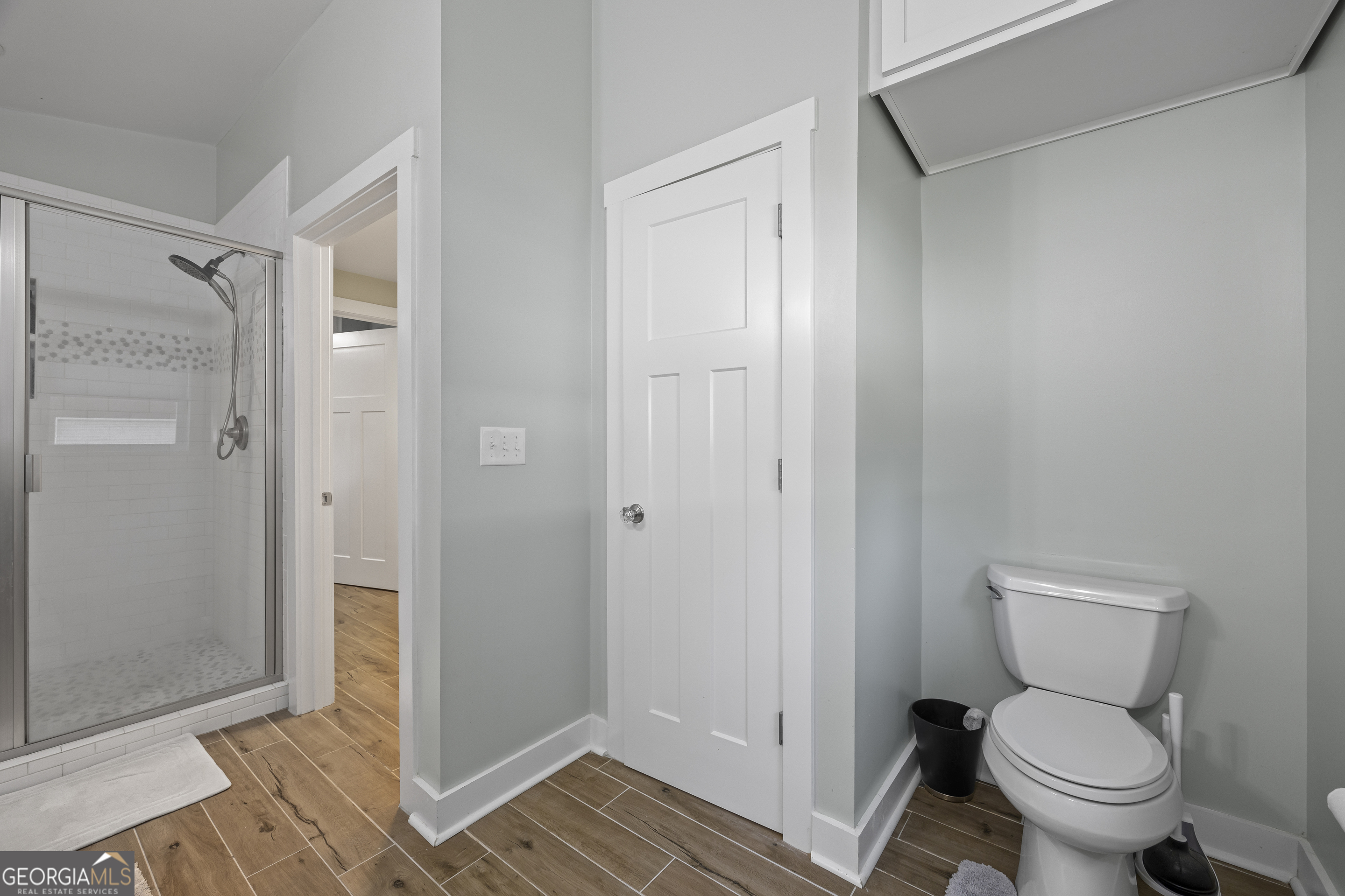 711 Shackelford Road Royston, GA 30662 - Photo 26 of 50 a white toilet sitting next to a bathroom sink