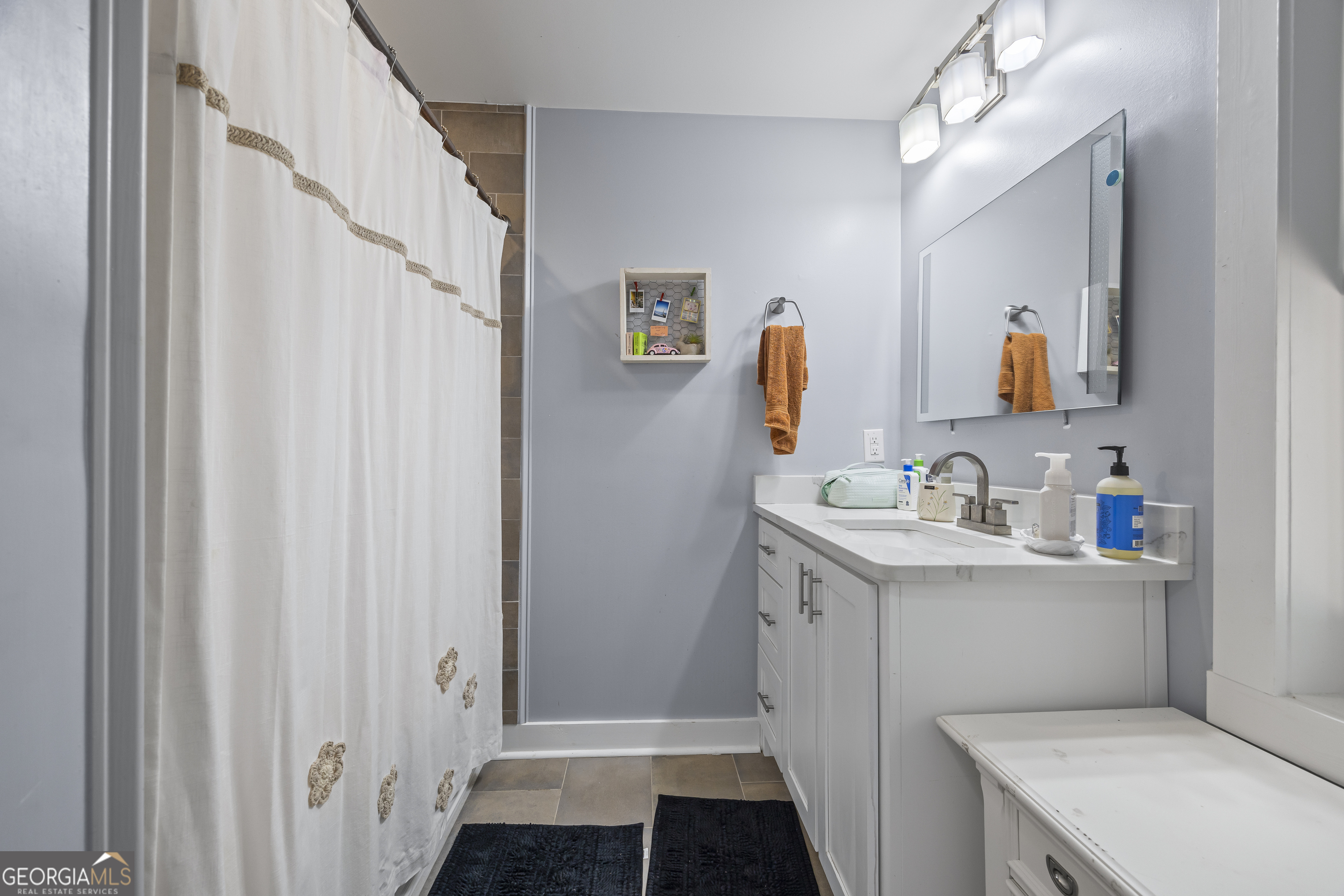 711 Shackelford Road Royston, GA 30662 - Photo 31 of 50 a bathroom with sink and mirror