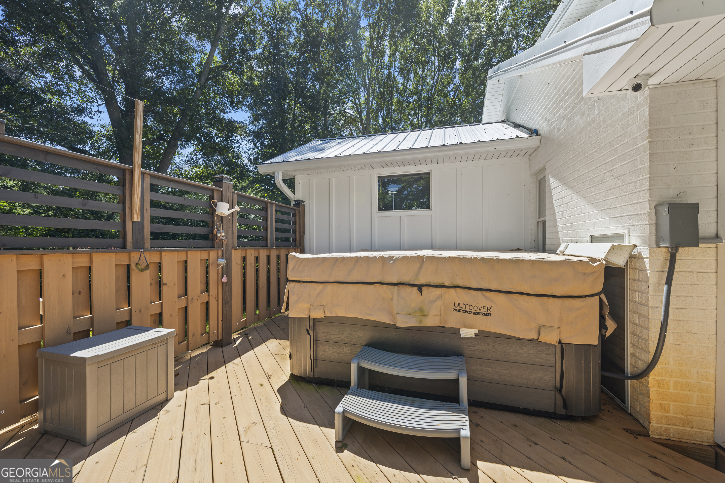 711 Shackelford Road Royston, GA 30662 - Photo 36 of 50 a view of a deck with couches and wooden floor