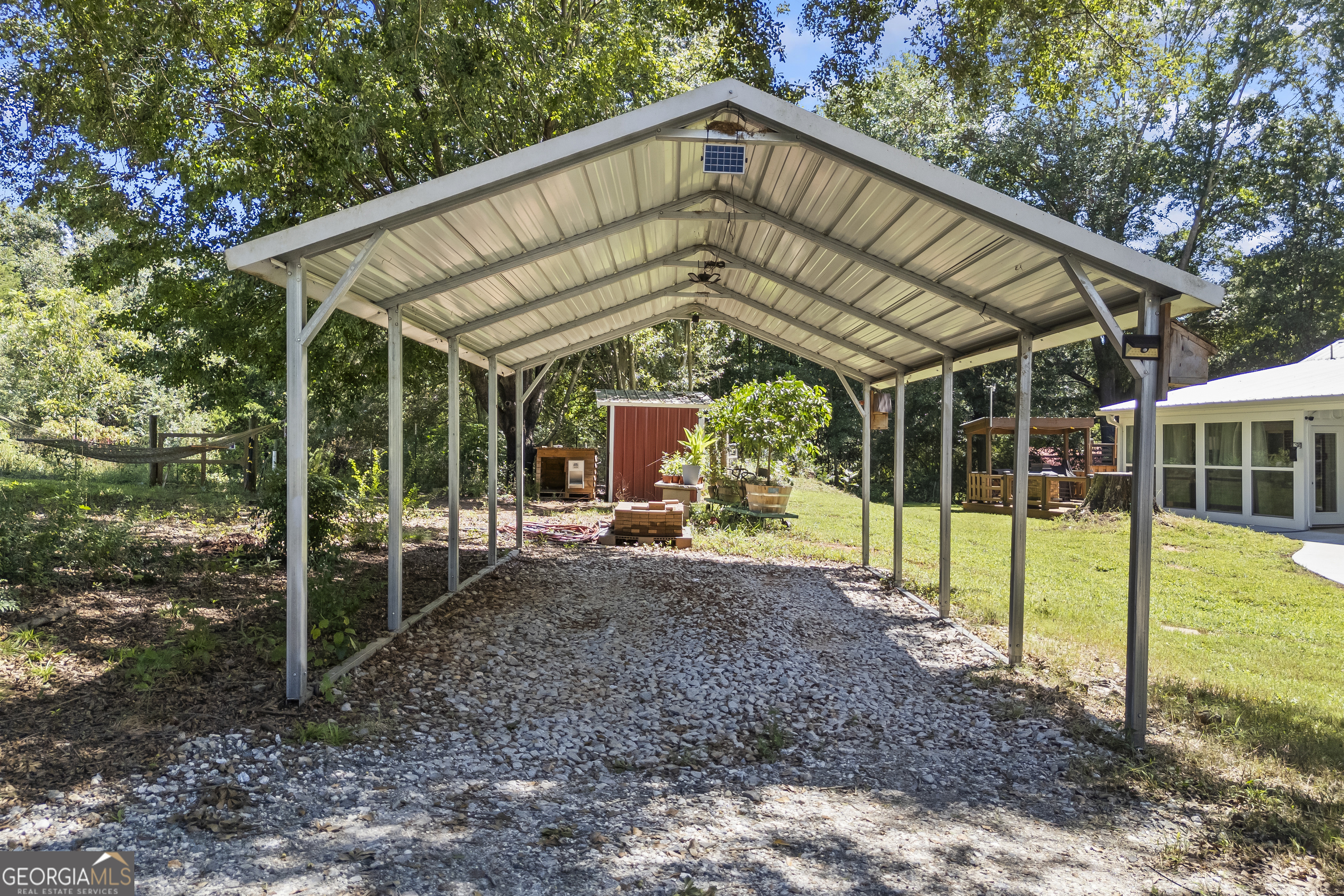 711 Shackelford Road Royston, GA 30662 - Photo 38 of 50 a view of a house with backyard and chairs