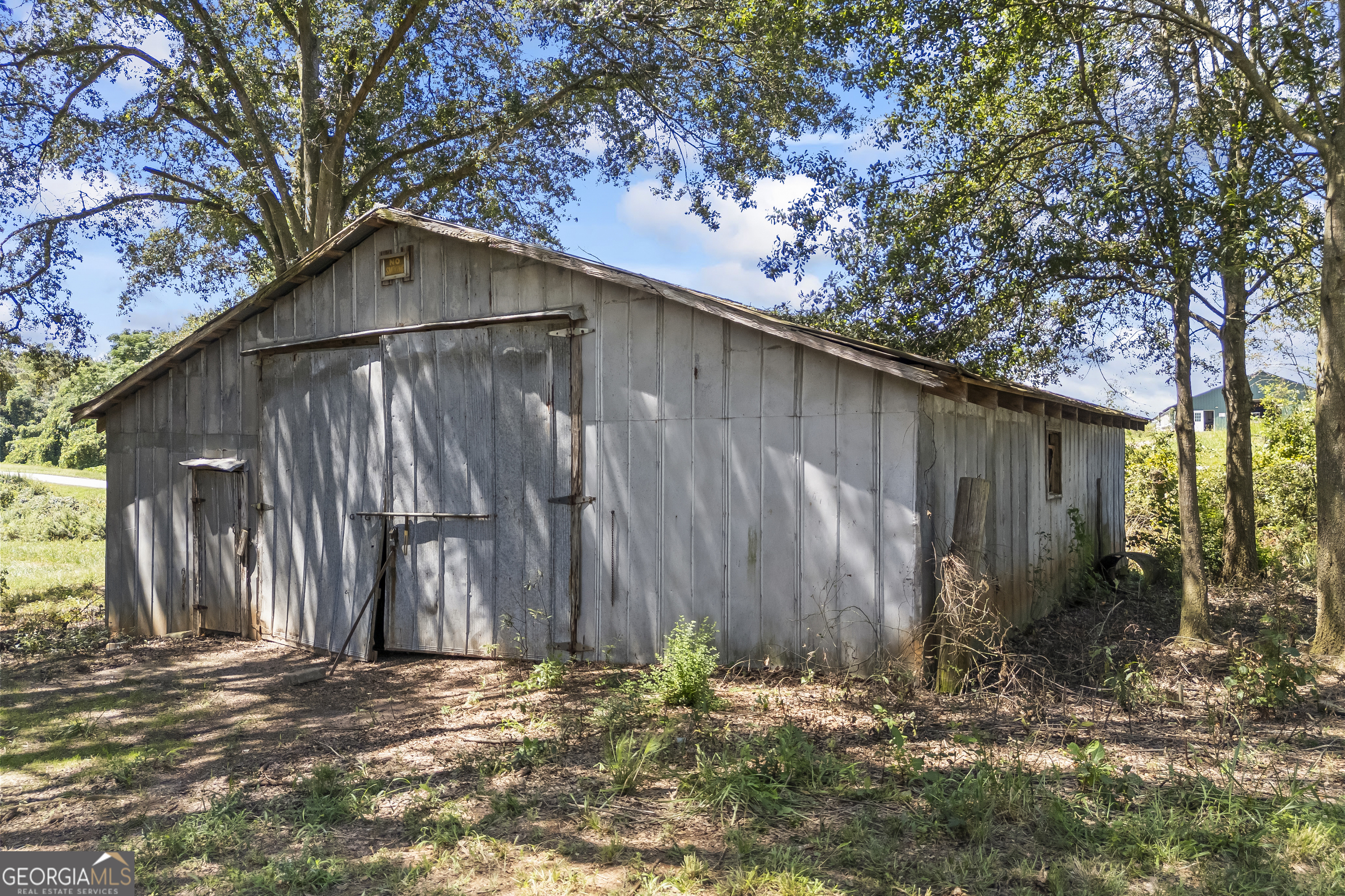 711 Shackelford Road Royston, GA 30662 - Photo 41 of 50 a backyard of house with trees