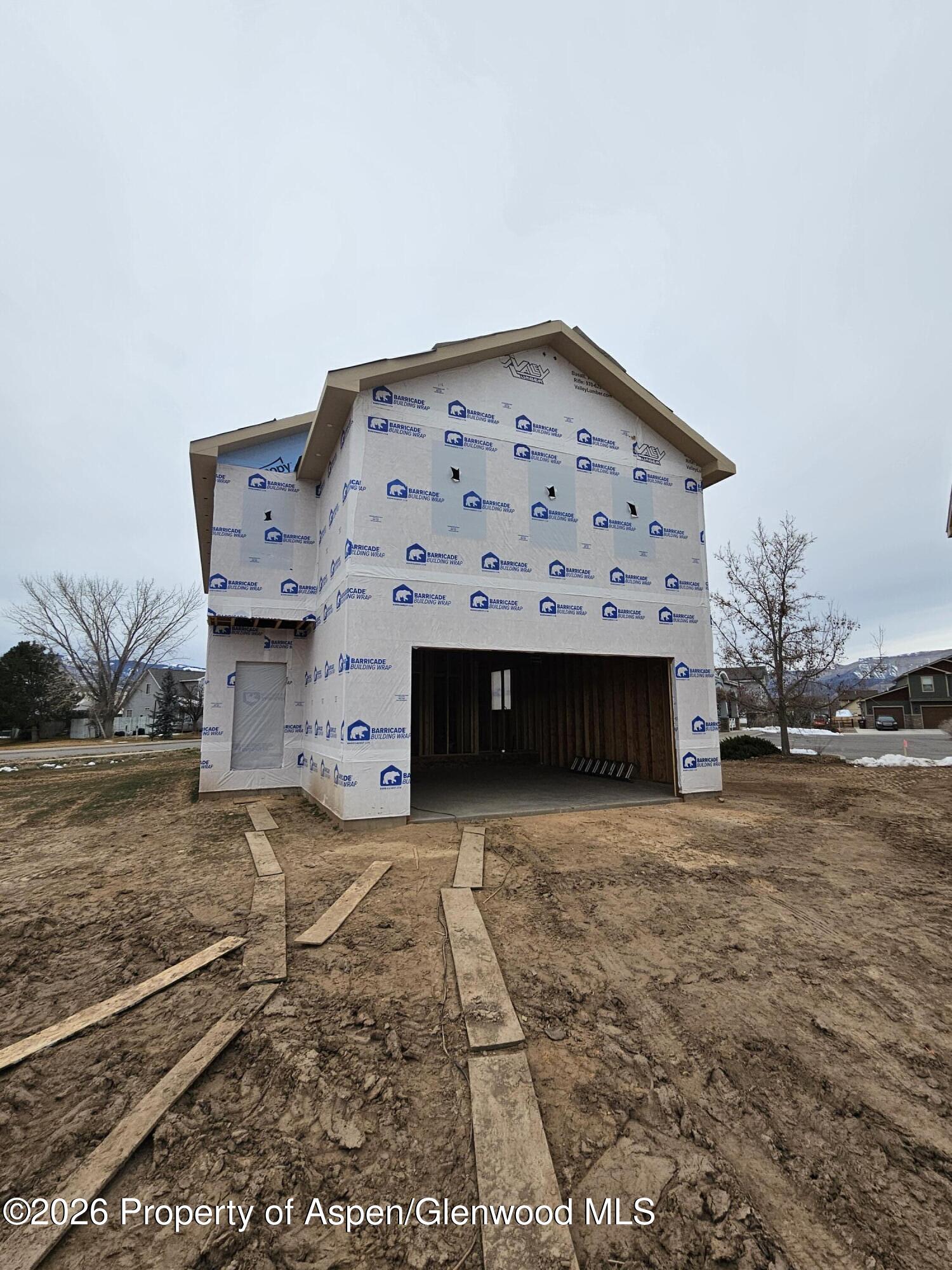 an empty room with a fireplace