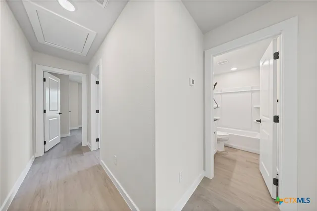 a view of a bathroom with a sink and a toilet