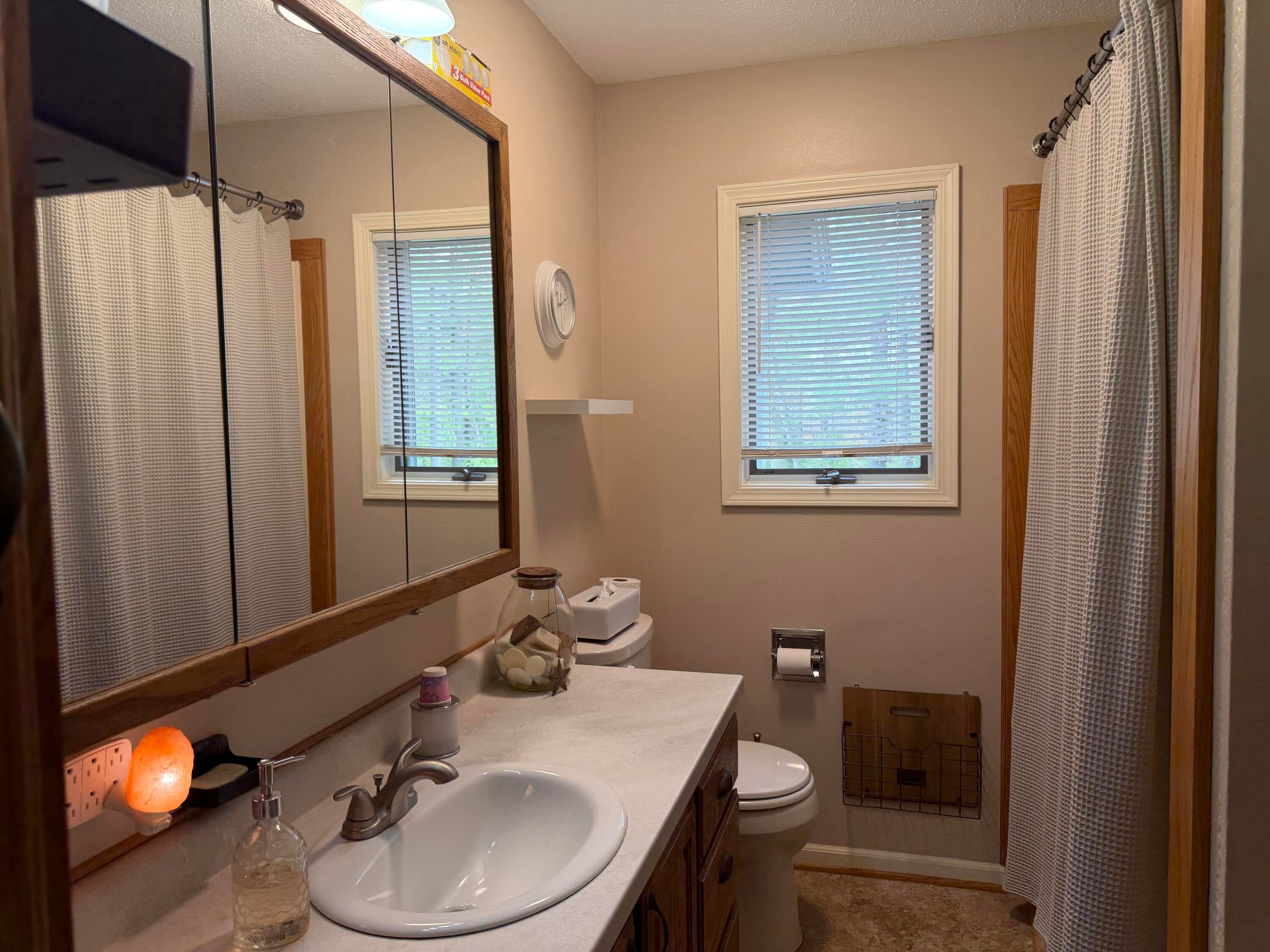 580 Long Rapids Road Alpena, MI 49707 - Photo 18 of 45 FULL BATH ON MAIN LEVEL NEXT TO BEDROOM