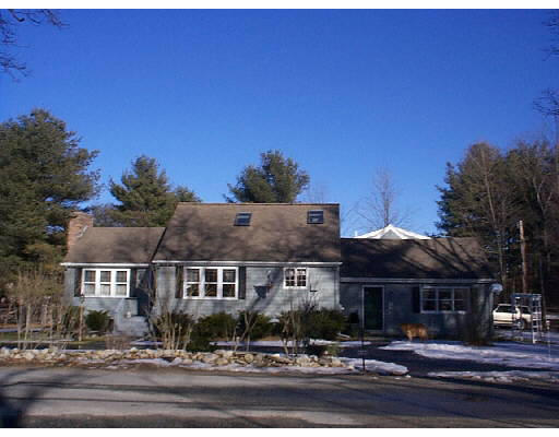 67 Sanderson Road Littleton, MA 01460 - Photo 1 of 1 a front view of a house with a yard