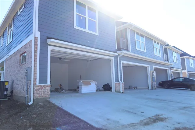 a view of a house with entryway and wooden floor