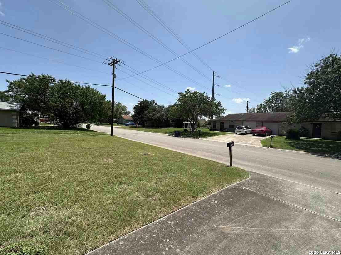 1533 Eichen Road New Braunfels, TX 78130 - Photo 5 of 24 a swimming pool with lots of green space and outdoor seating