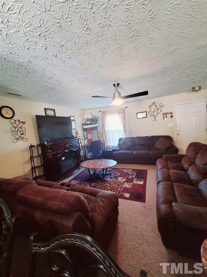 4232 Tensity Drive Raleigh, NC 27604 - Photo 3 of 13 a living room with furniture