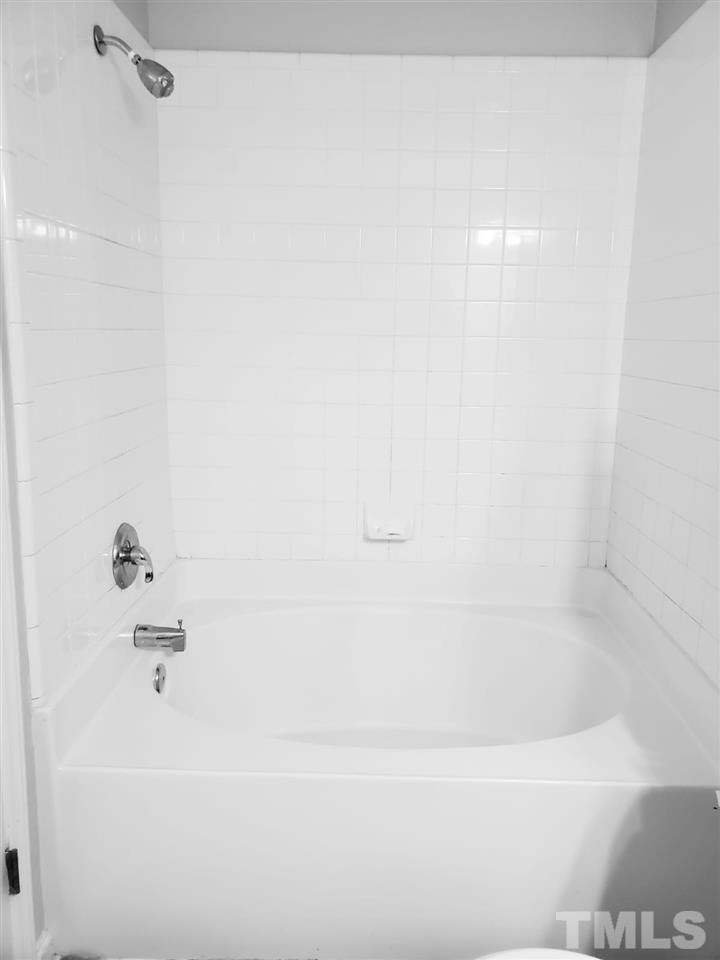 4232 Tensity Drive Raleigh, NC 27604 - Photo 10 of 13 a bathroom with a bathtub