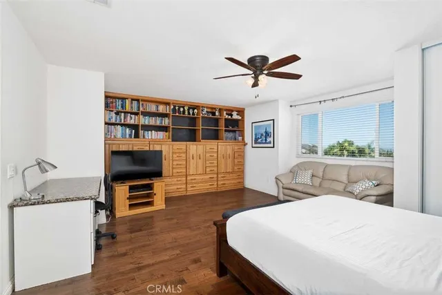 a bedroom with furniture and a bed