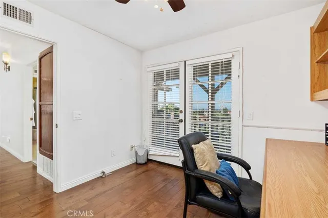 a view of a chair and table in a room