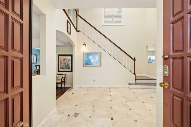 a view of entryway with wooden floor