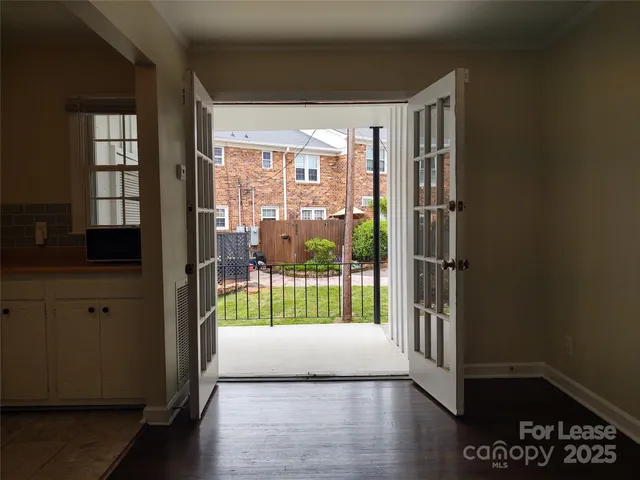 a view of entryway with a floor to ceiling window