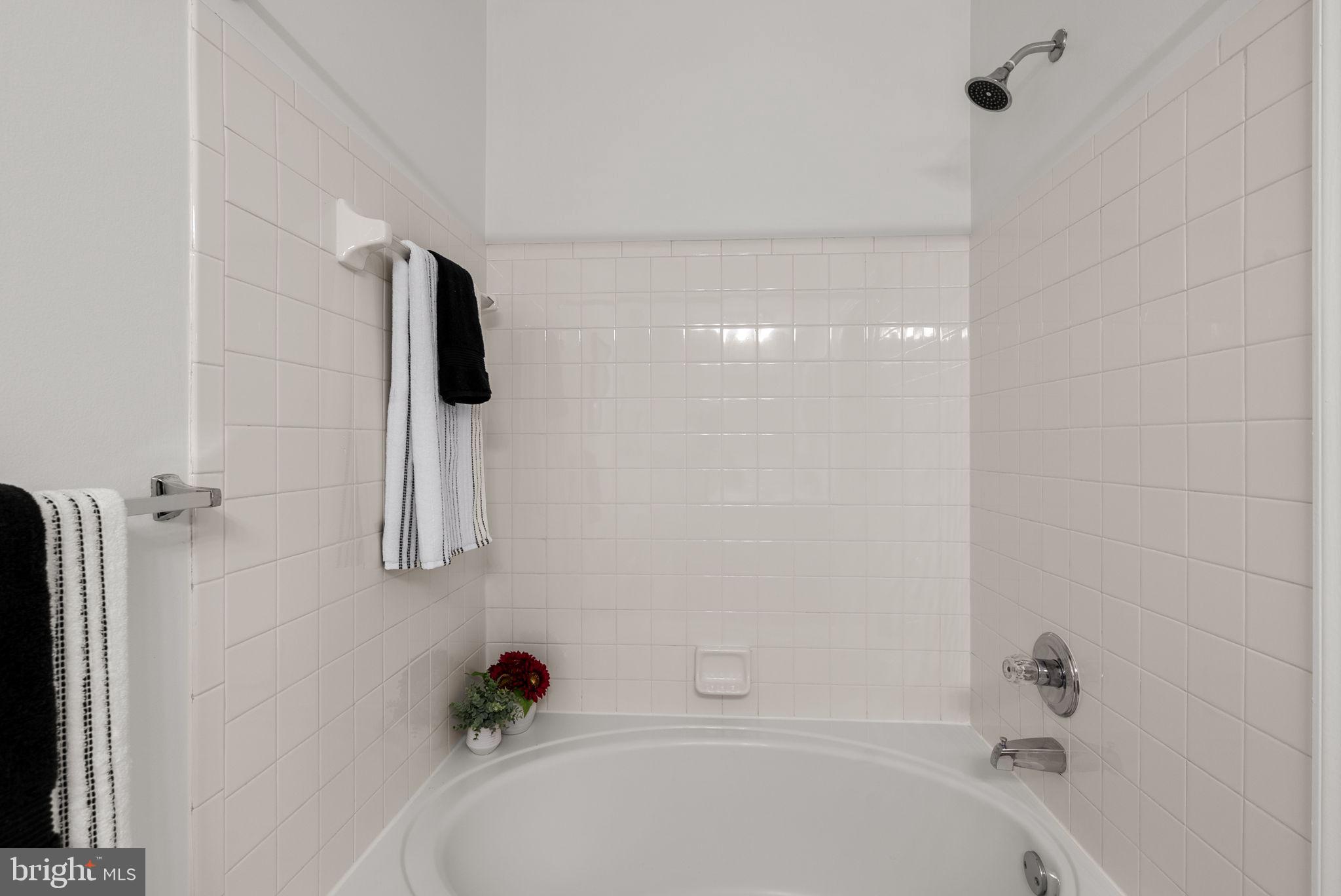 12708 Found Stone Road, Unit 3304 Germantown, MD 20876 - Photo 18 of 40 a bathroom with a shower