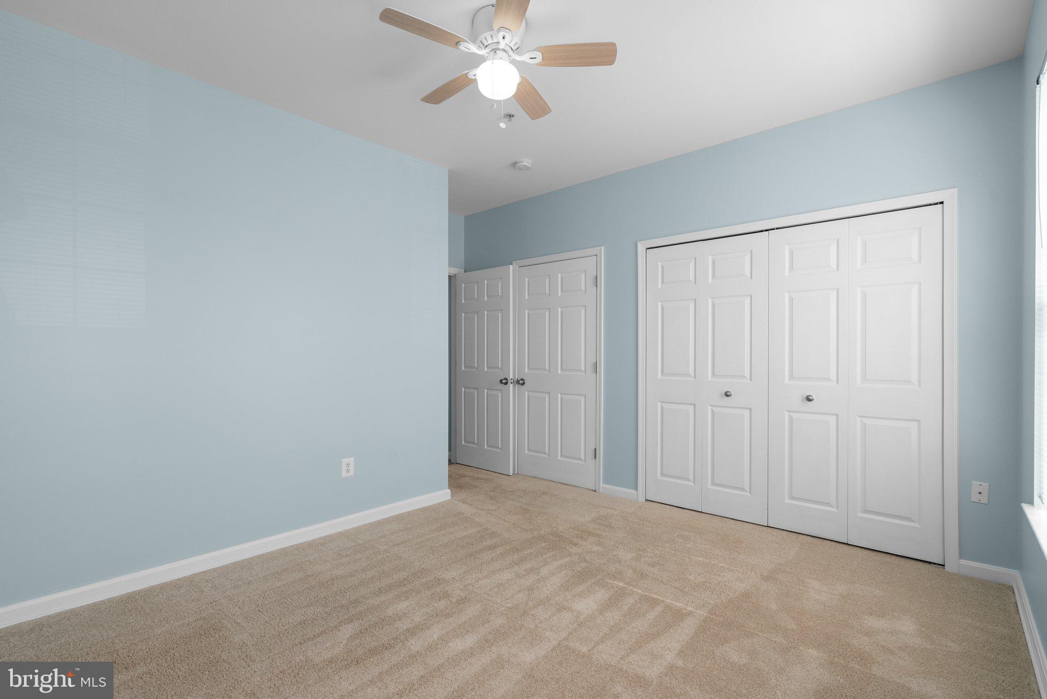 12708 Found Stone Road, Unit 3304 Germantown, MD 20876 - Photo 20 of 40 a view of an empty room and chandelier fan
