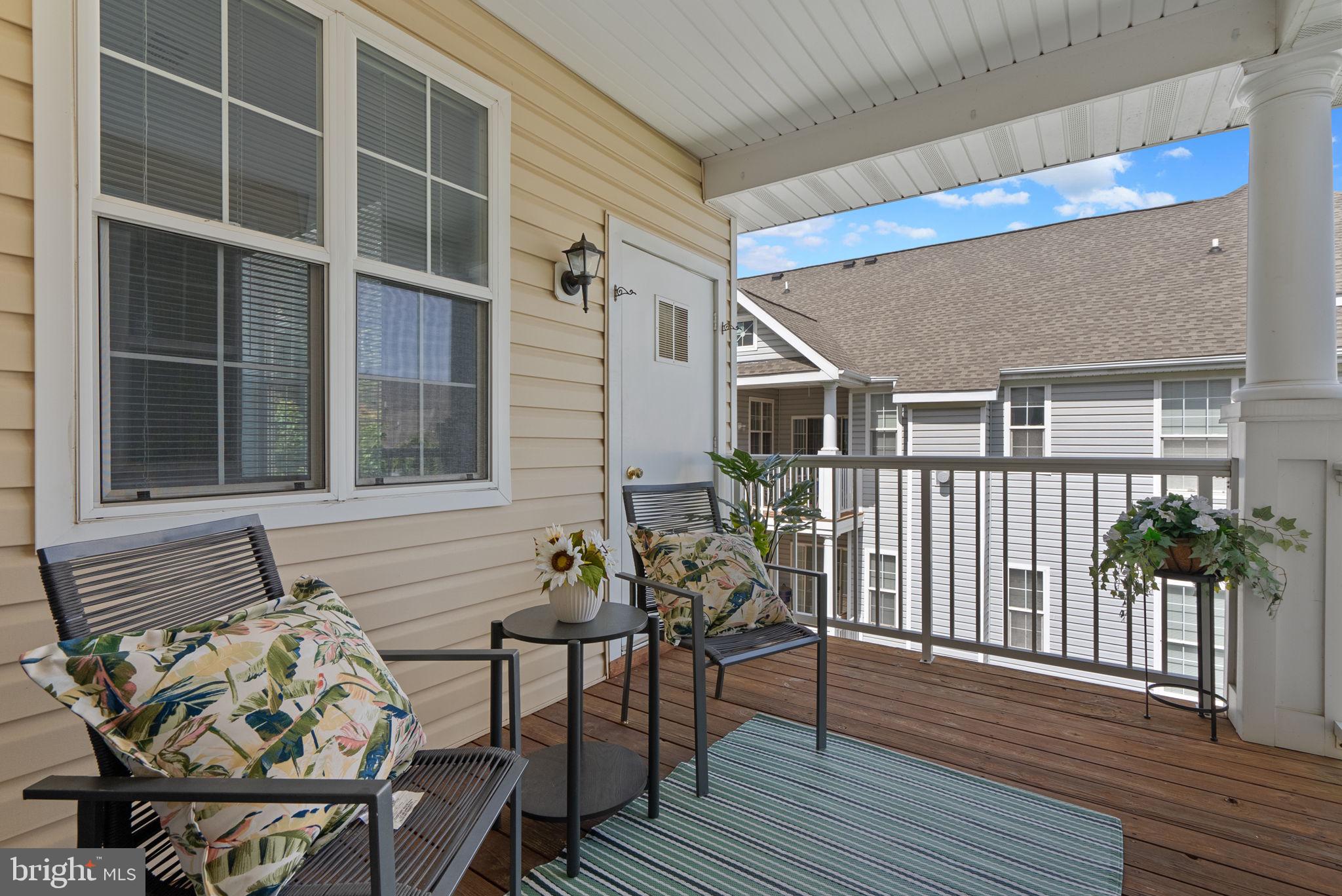 12708 Found Stone Road, Unit 3304 Germantown, MD 20876 - Photo 22 of 40 a view of a house with backyard and sitting area