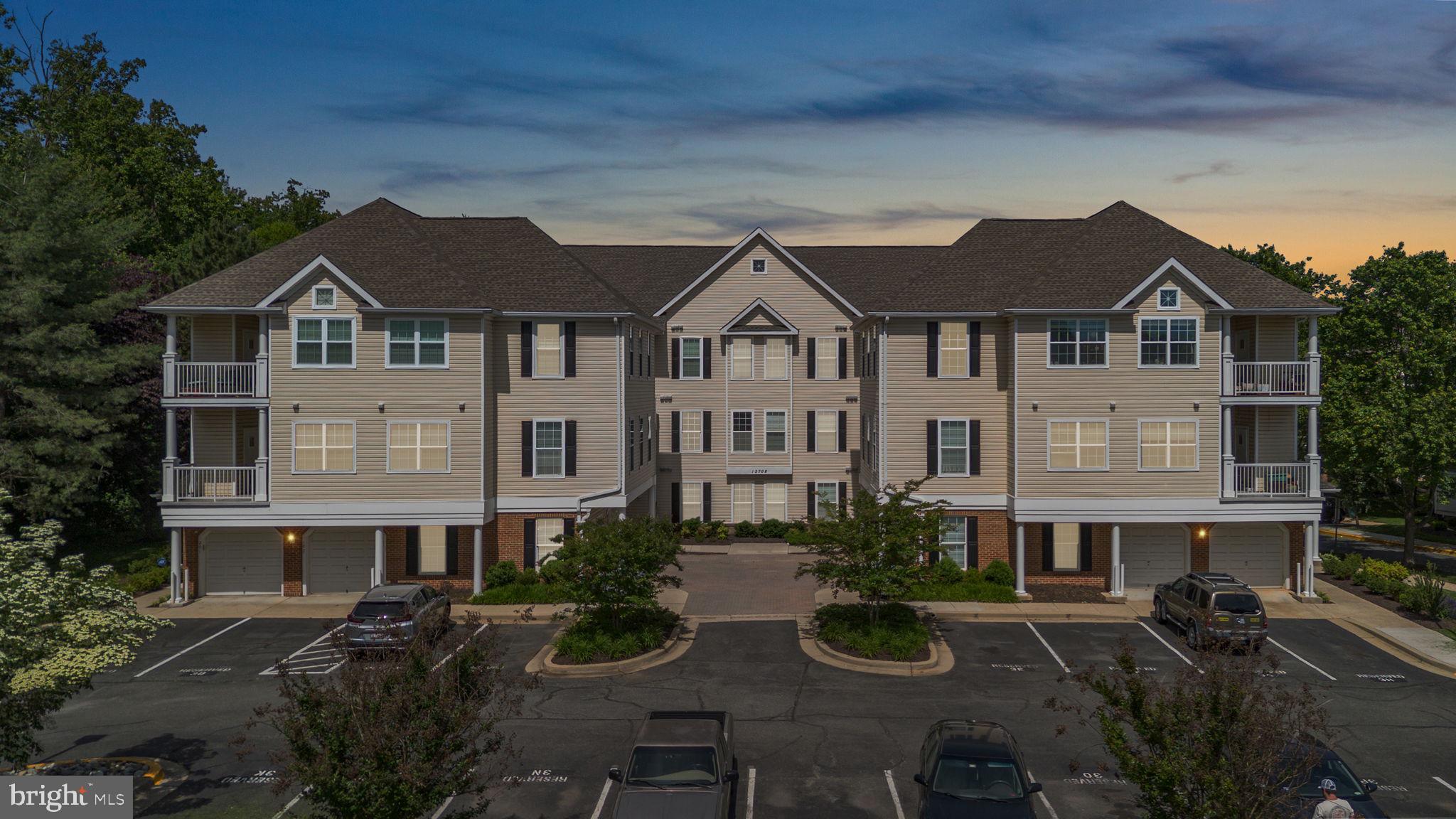 12708 Found Stone Road, Unit 3304 Germantown, MD 20876 - Photo 31 of 40 a view of house with yard outdoor seating area and green space