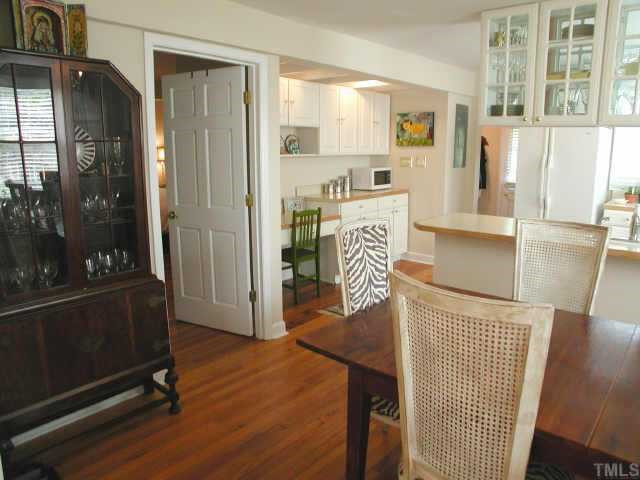 305 Taylor Street Raleigh, NC 27607 - Photo 5 of 11 There is a desk and great storage in additional cabinets in the kitchen Other