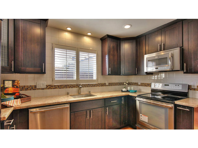 262 Maria Street Santa Clara, CA 95050 - Photo 11 of 22 a kitchen with a sink stove and microwave