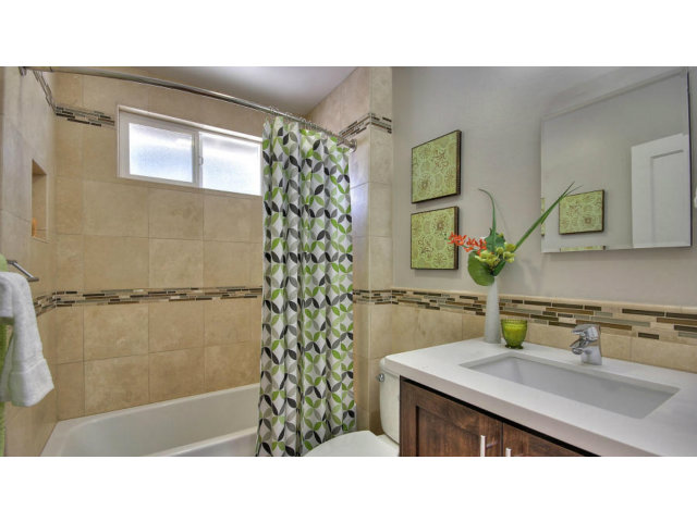 262 Maria Street Santa Clara, CA 95050 - Photo 16 of 22 a bathroom with a sink and a mirror