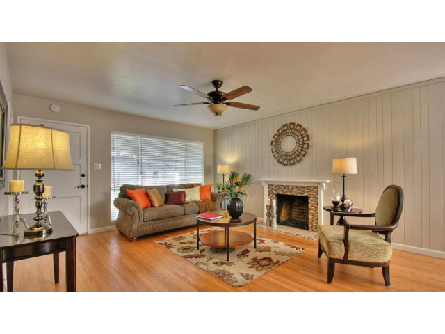 262 Maria Street Santa Clara, CA 95050 - Photo 5 of 22 a living room with furniture a fireplace and a large window