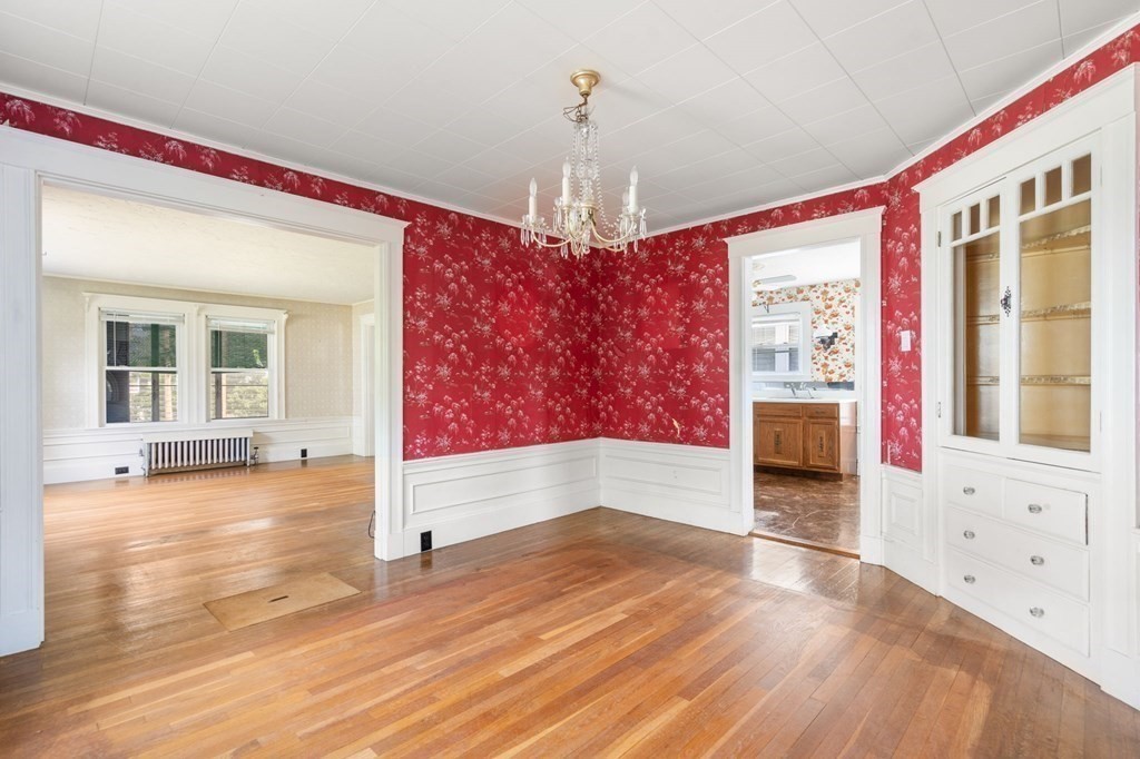 39 Reedsdale Road Milton, MA 02186 - Photo 1 of 25 a view of an entryway with wooden floor and door