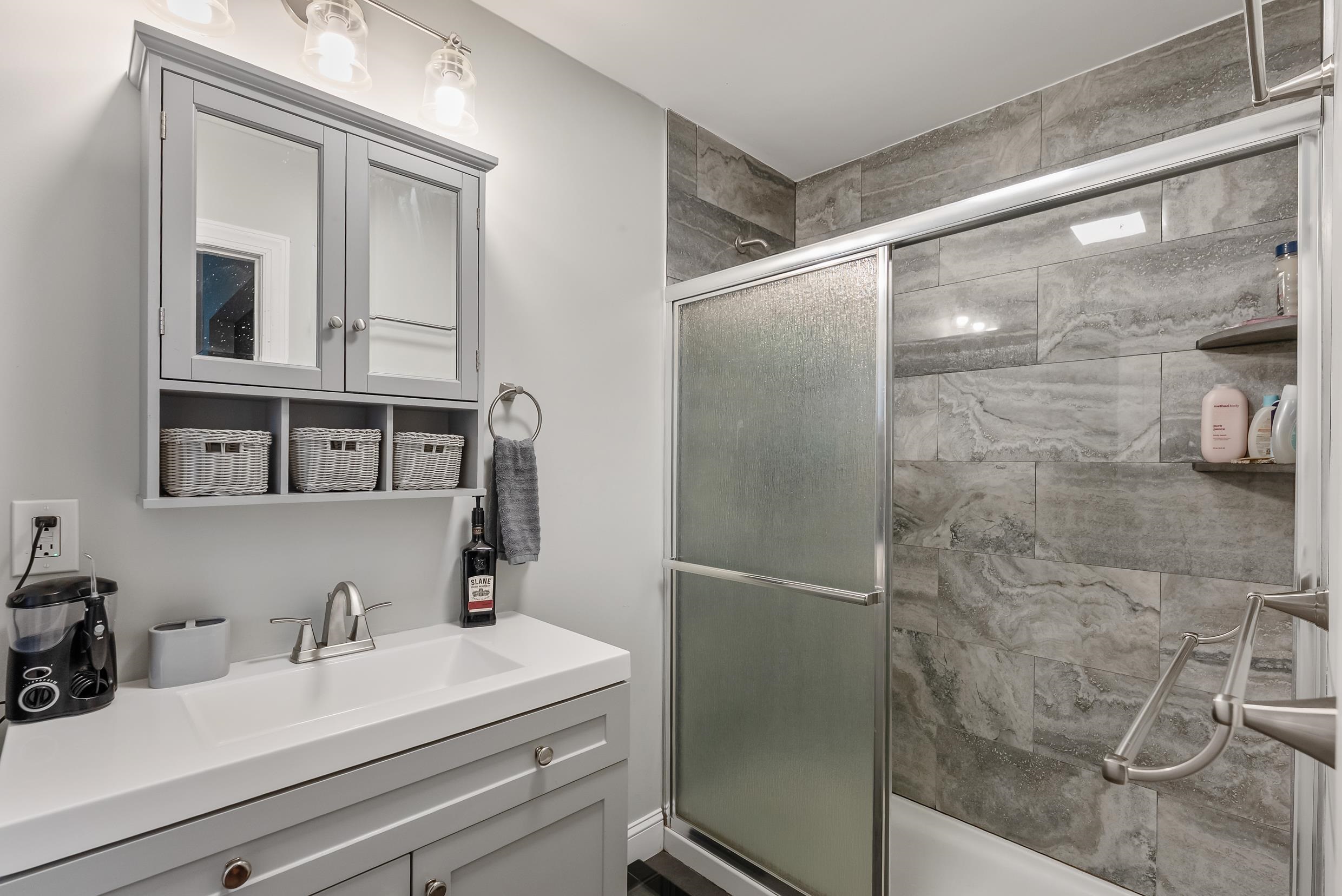 134 Arbor Road Villas, NJ 08251 - Photo 13 of 27 a bathroom with a sink vanity and tub