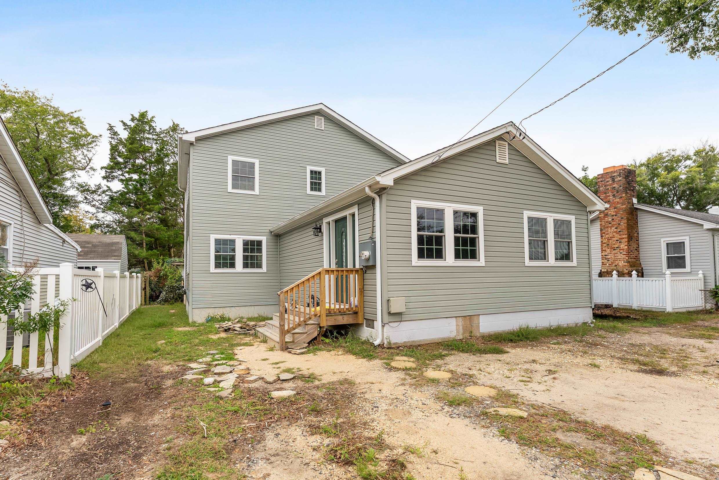 134 Arbor Road Villas, NJ 08251 - Photo 24 of 27 a view of a house with a yard