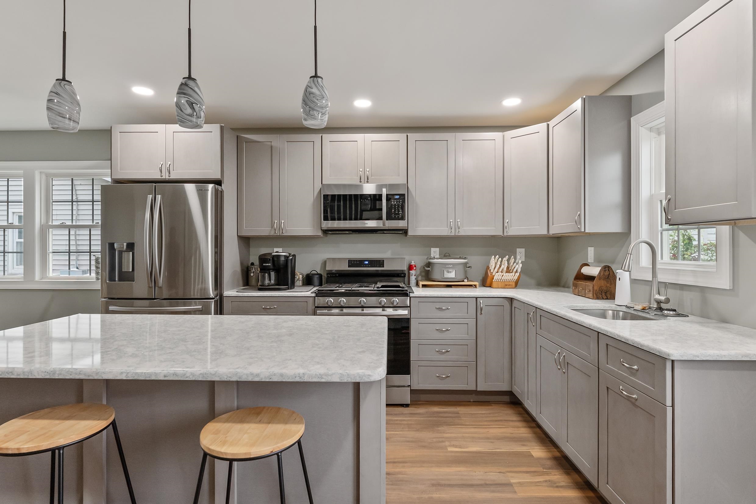 134 Arbor Road Villas, NJ 08251 - Photo 9 of 27 a kitchen with kitchen island a sink stove and refrigerator