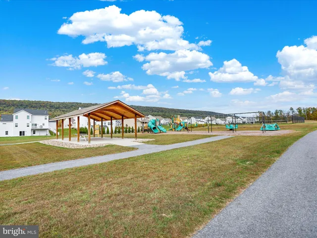 a view of an outdoor space and tennis court