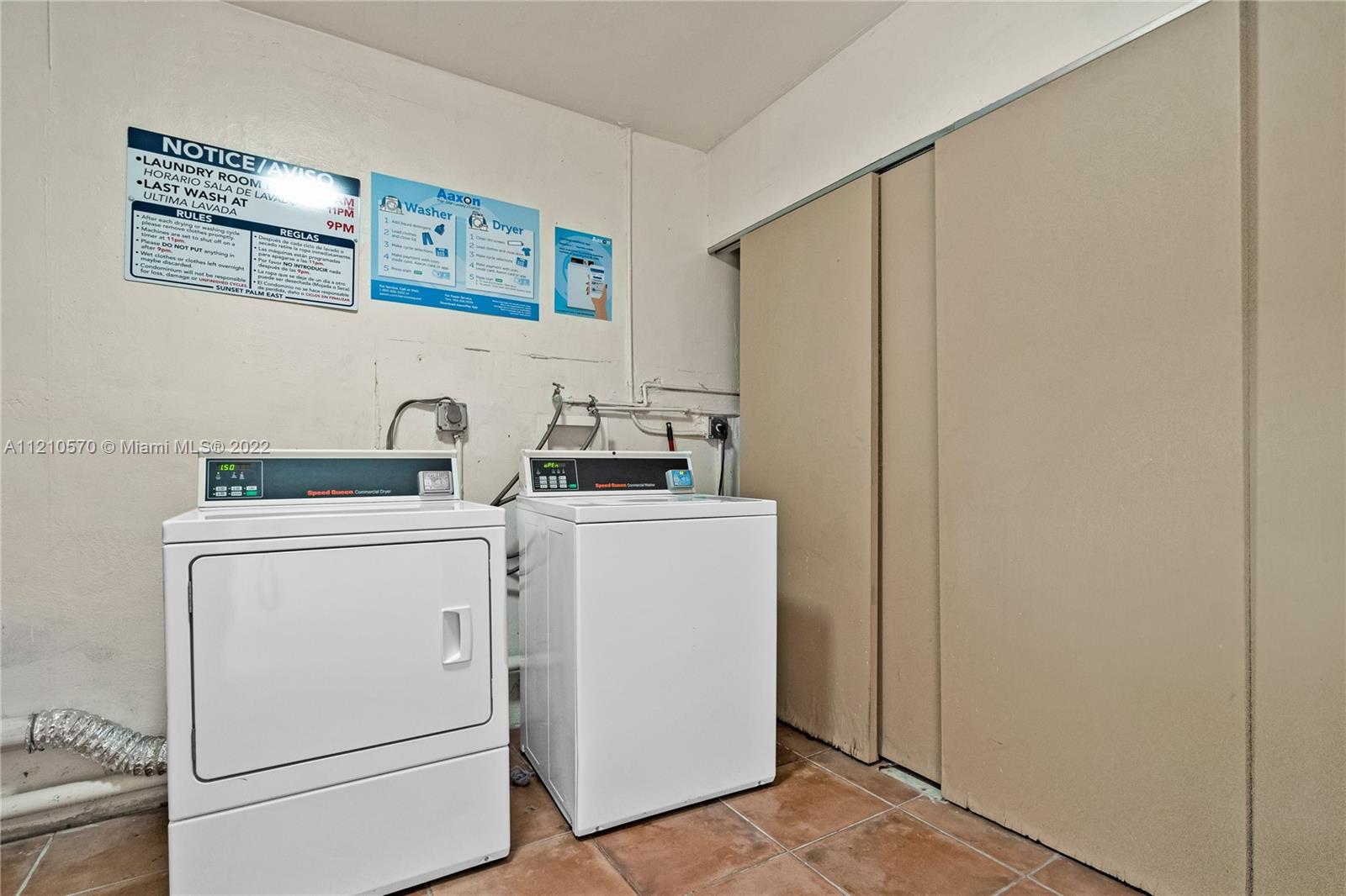 9459 Southwest 76th Street, Unit R7 Miami, FL 33173 - Photo 24 of 24 a utility room with dryer and washer